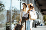Two women shopping on a high street